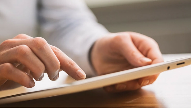 Male using a tablet