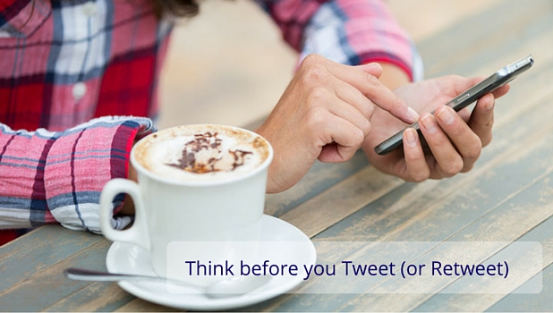 Person on mobile with coffee
