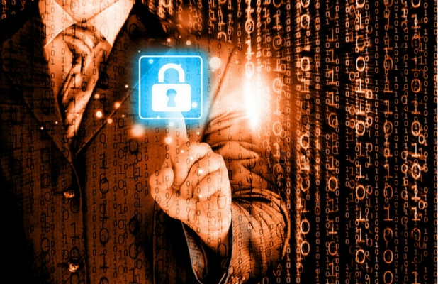Suited male pressing a lock button