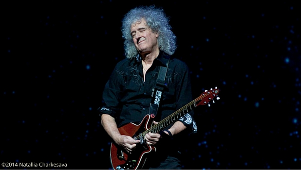 Brian May from Queen performing